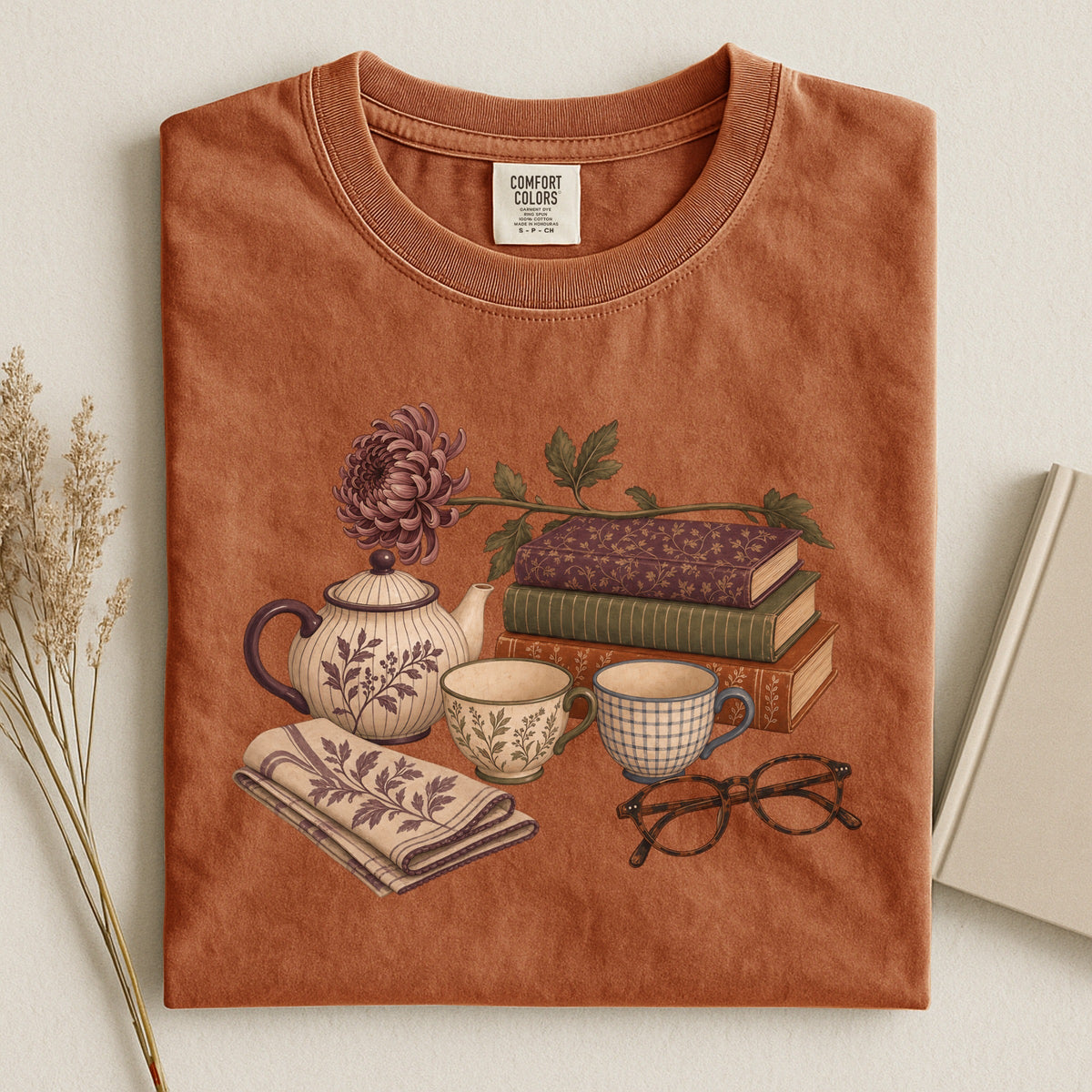 Afternoon Tea and Books bookish tee in Yam, flat lay