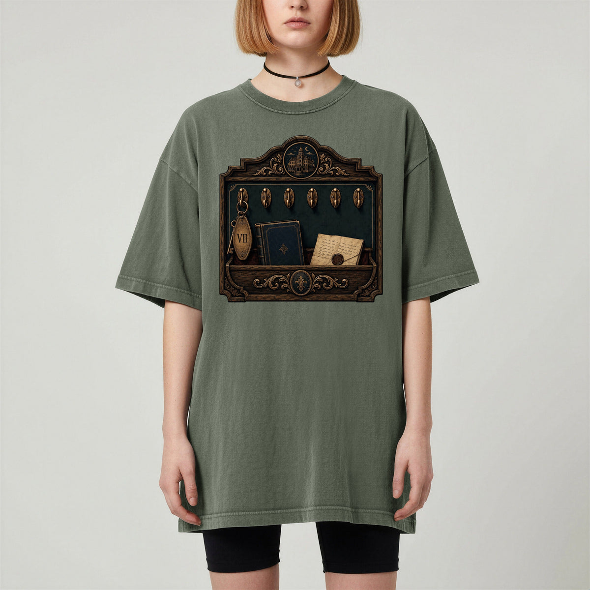 Library Key Board bookish tee in Moss, worn