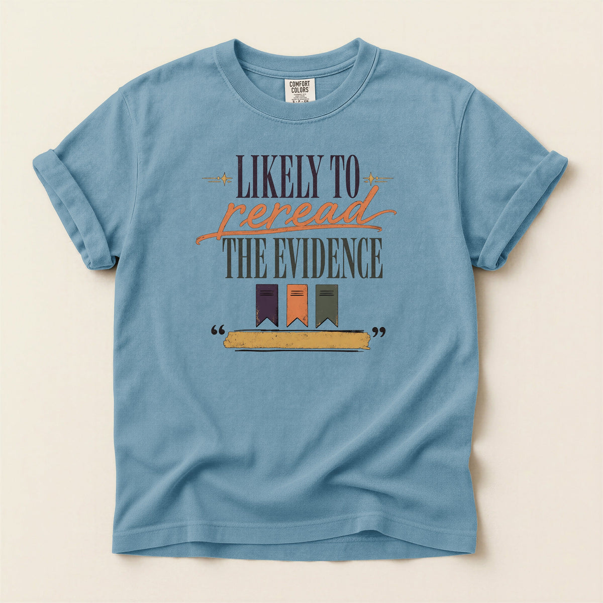 Likely to Reread the Evidence bookish tee in Ice Blue, full flat