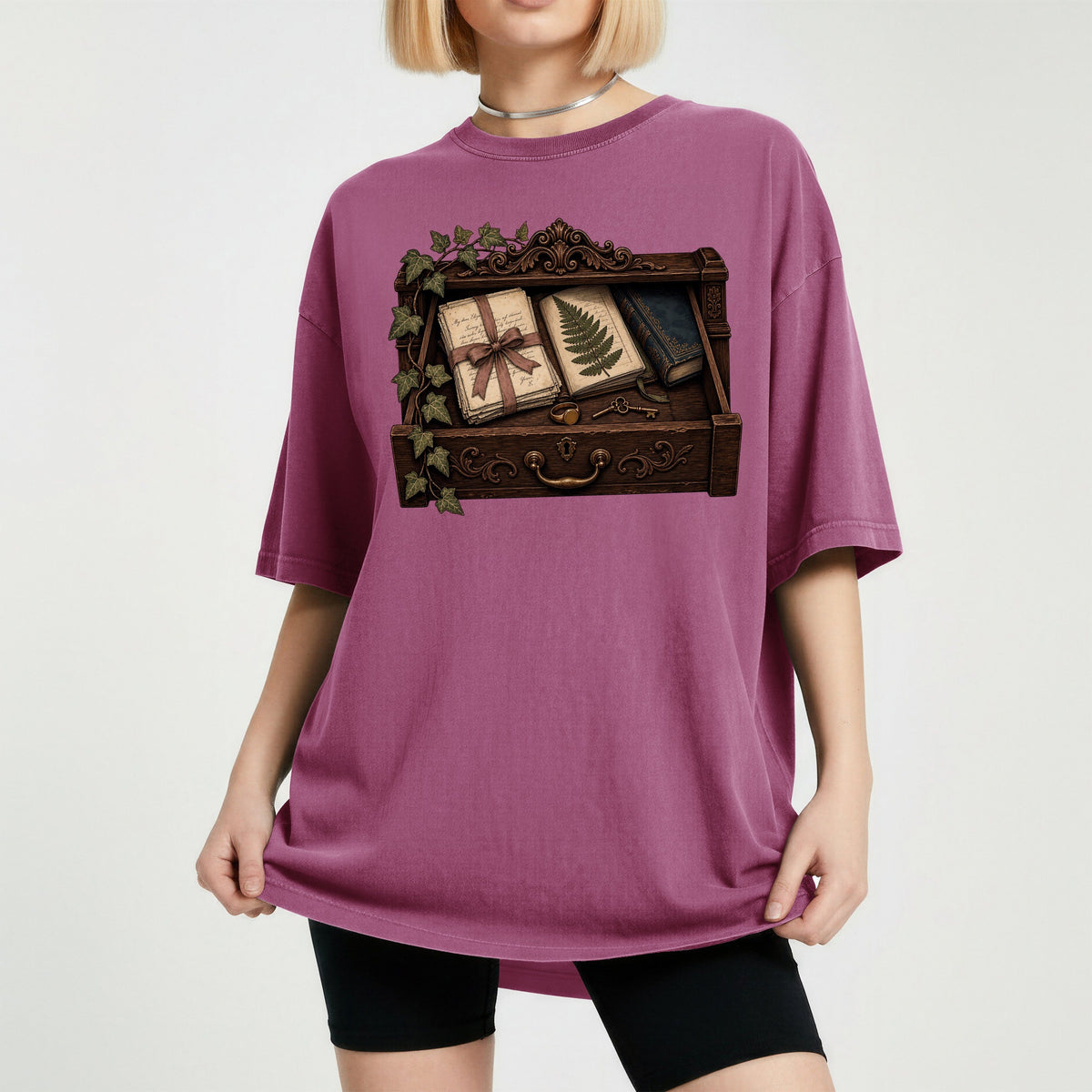 Reader's Keepsake Drawer bookish tee in Berry, worn