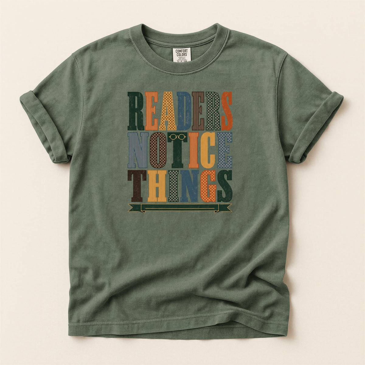 Readers Notice Things bookish tee in Moss, full flat