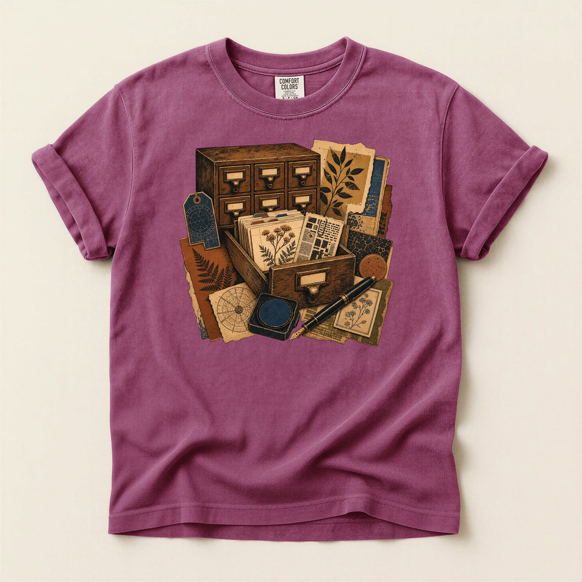 The Card Catalog bookish tee in Berry, full flat