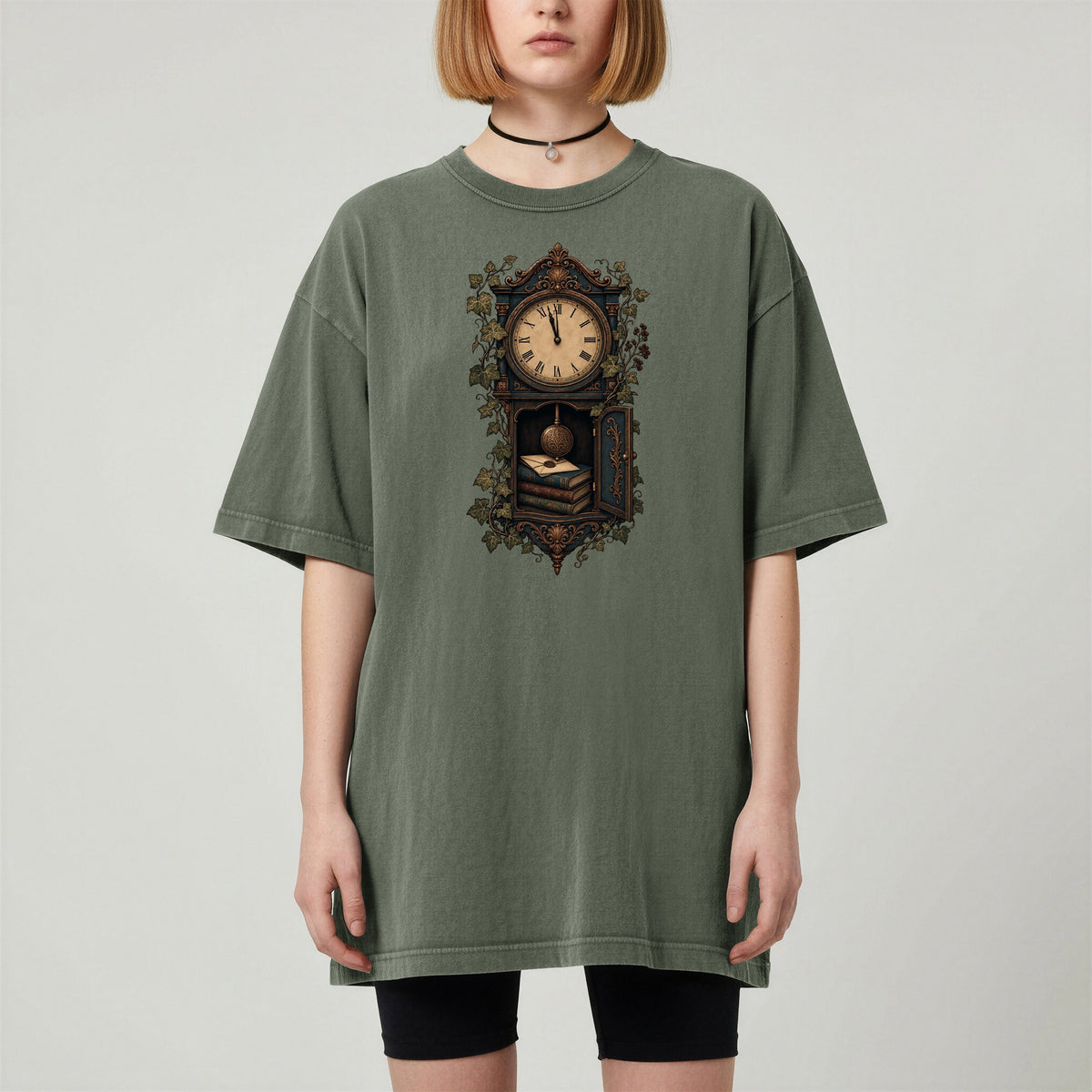 The Reading Hour bookish tee in Moss, worn