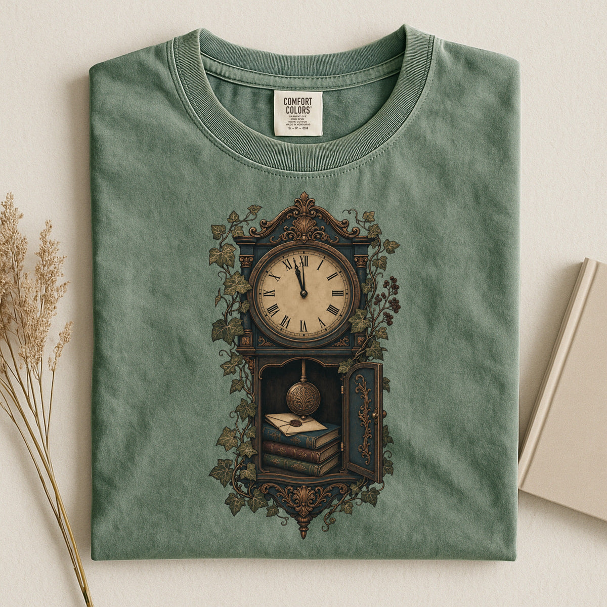 The Reading Hour bookish tee in Moss, flat lay