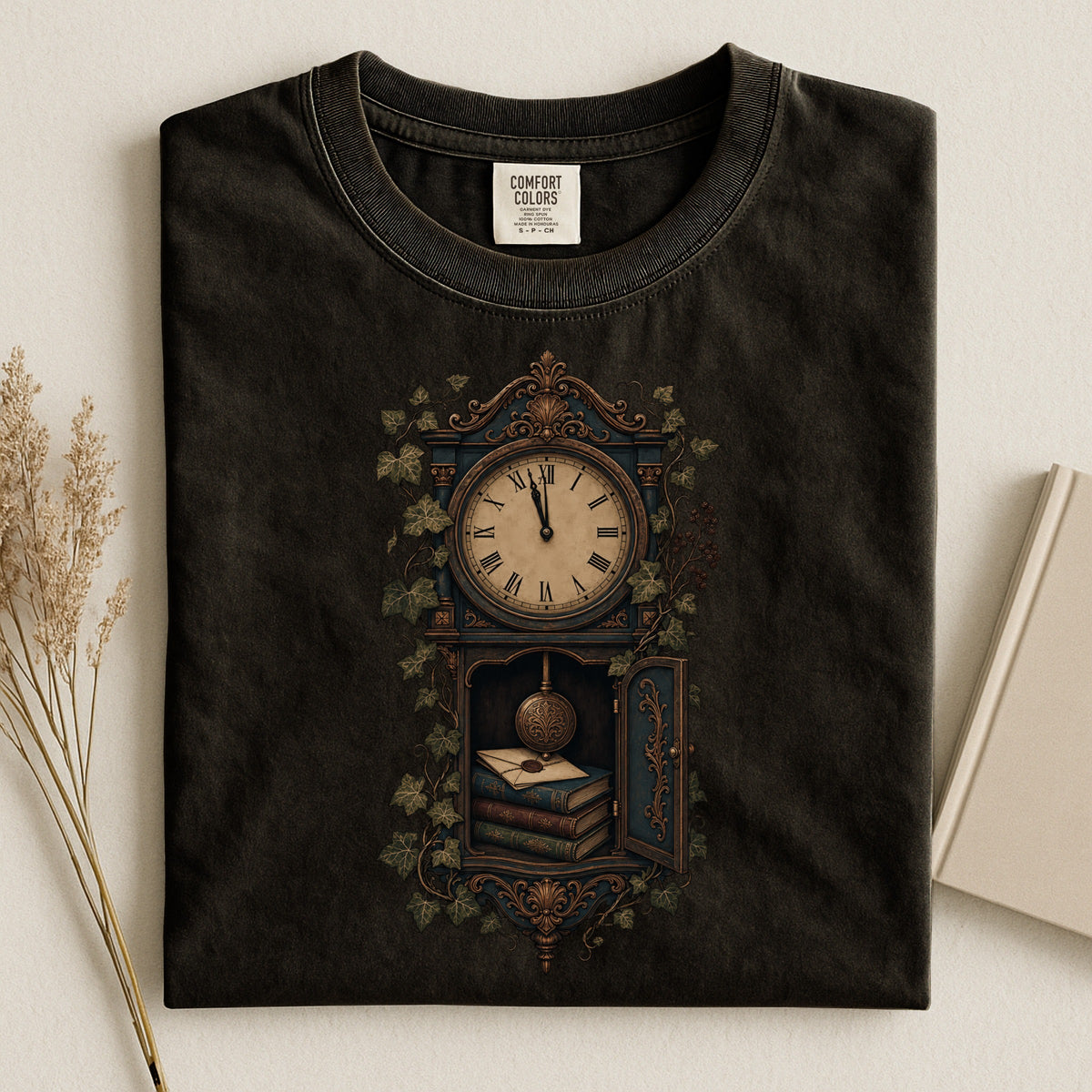 The Reading Hour bookish tee in Black, flat lay