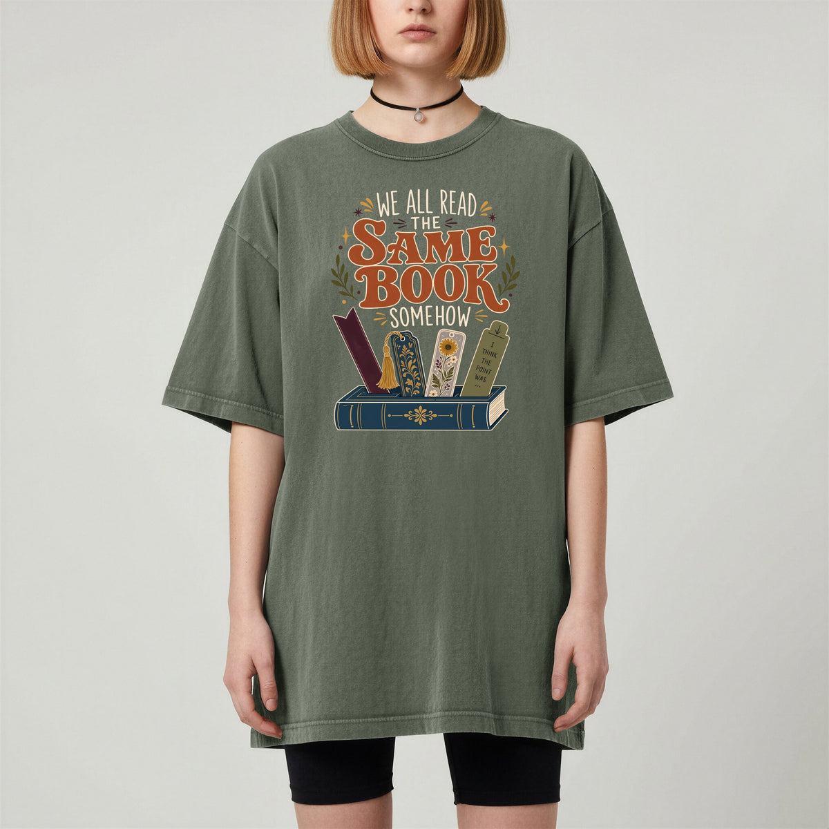 We All Read the Same Book Somehow bookish tee in Moss, worn