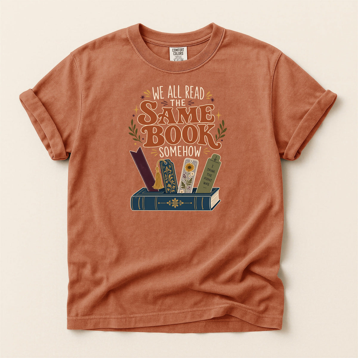 We All Read the Same Book Somehow bookish tee in Yam, full flat