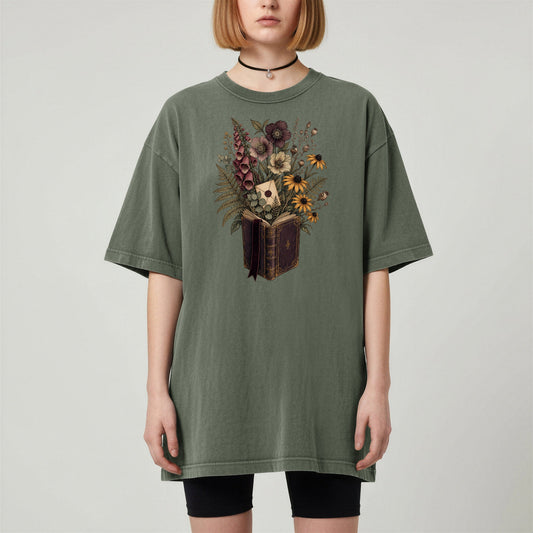 Wildflower Book Bouquet bookish tee in Moss, worn