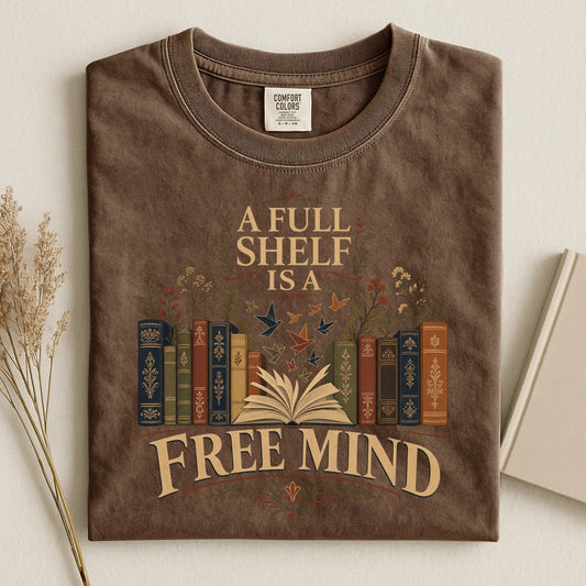 A Full Shelf Is a Free Mind bookish tee in Espresso, flat lay