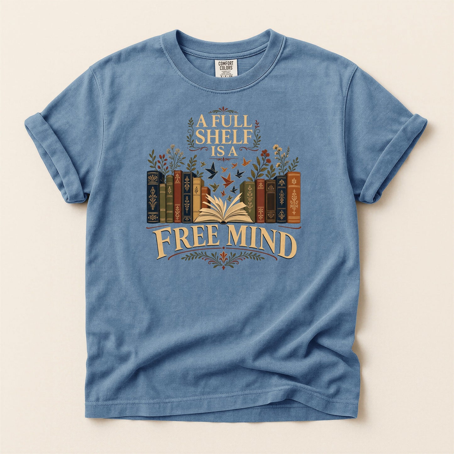 A Full Shelf Is a Free Mind bookish tee in Blue Jean, full flat