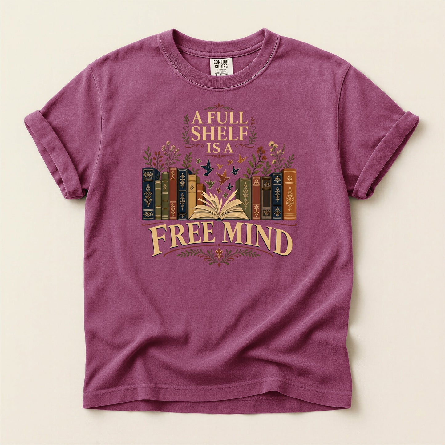 A Full Shelf Is a Free Mind bookish tee in Berry, full flat