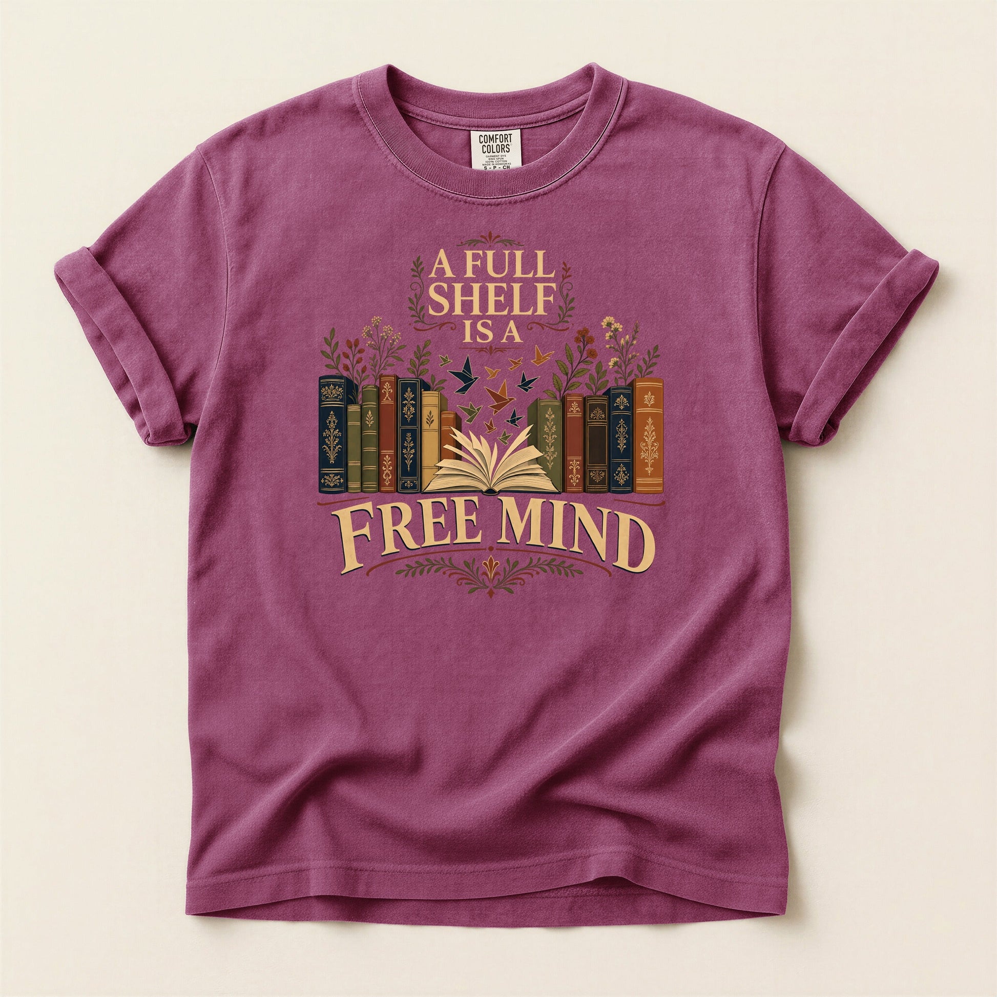A Full Shelf Is a Free Mind bookish tee in Berry, full flat