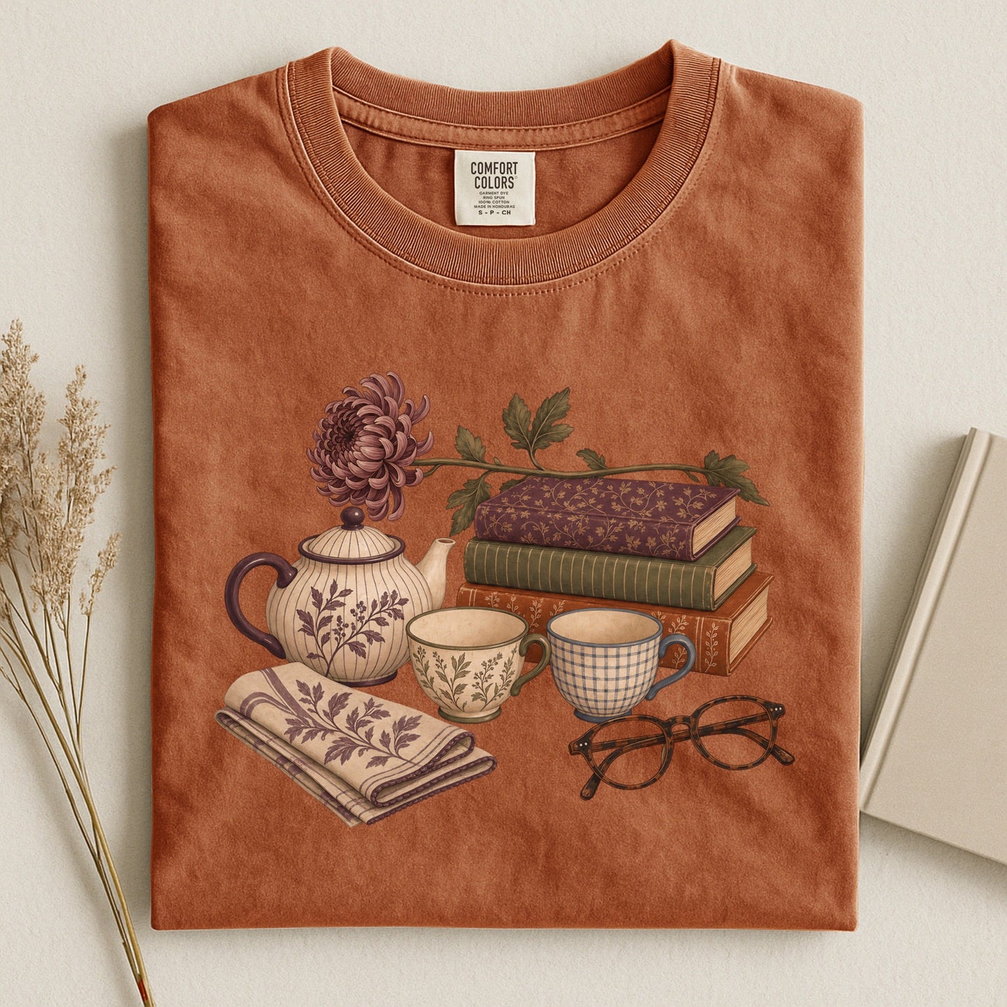 Afternoon Tea and Books bookish tee in Yam, flat lay