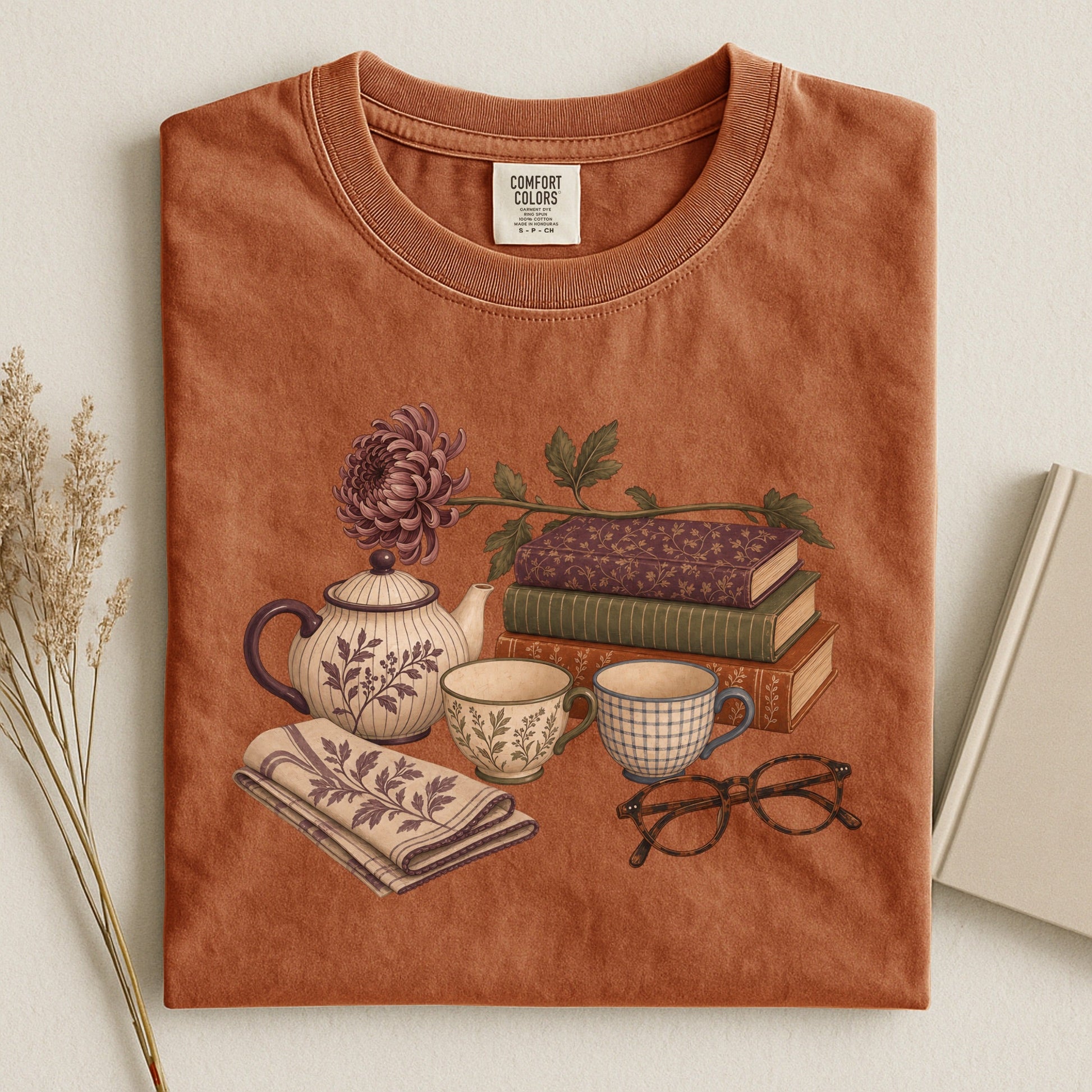 Afternoon Tea and Books bookish tee in Yam, flat lay