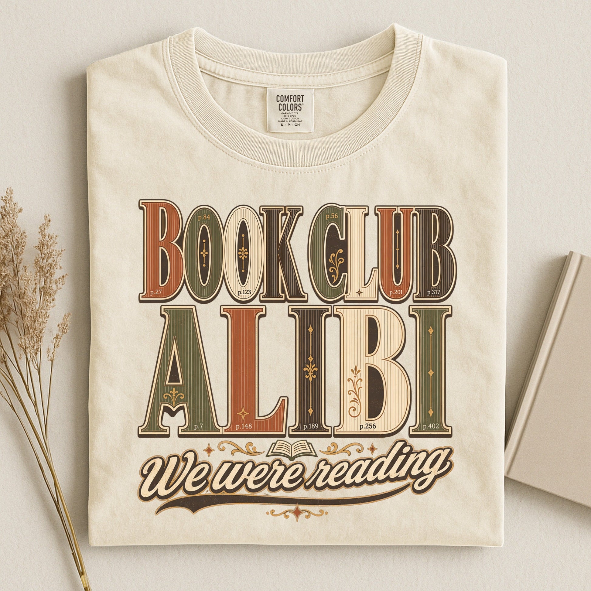 Book Club Alibi bookish tee in Ivory, flat lay