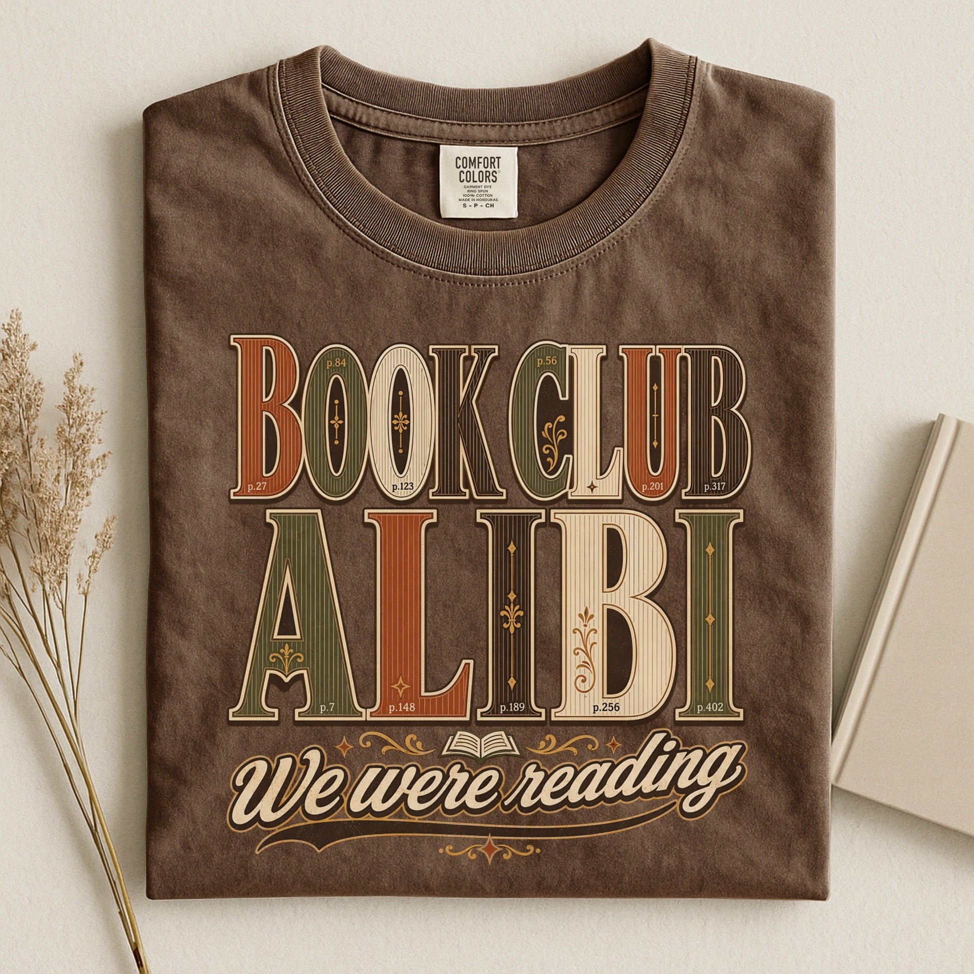 Book Club Alibi bookish tee in Espresso, flat lay