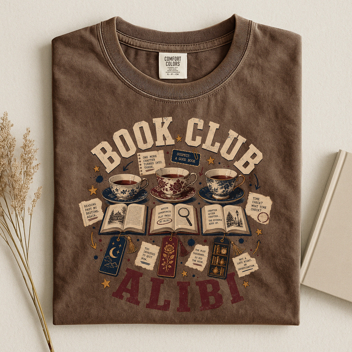 Shelf Love Studio Book Club Alibi t-shirt in Espresso, styled flat lay