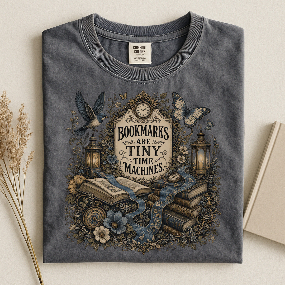 Bookmarks Are Tiny Time Machines bookish tee in Pepper, flat lay
