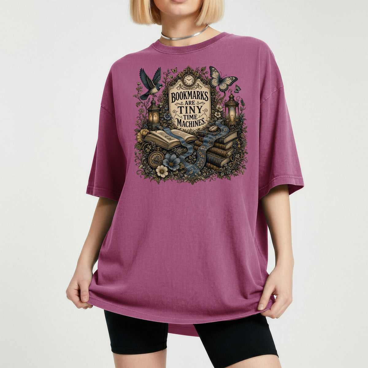 Bookmarks Are Tiny Time Machines bookish tee in Berry, worn