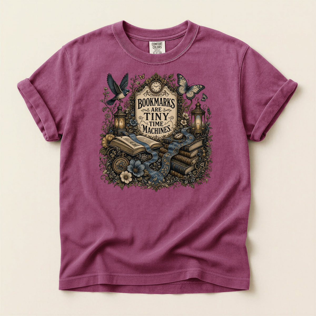 Bookmarks Are Tiny Time Machines bookish tee in Berry, full flat