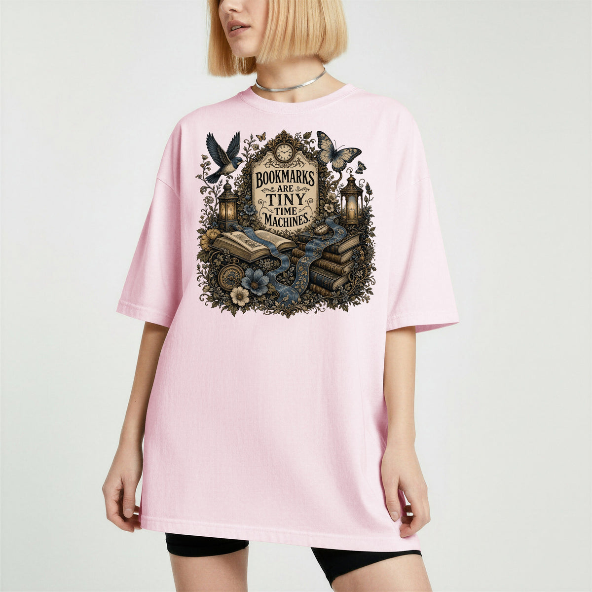 Bookmarks Are Tiny Time Machines bookish tee in Blossom, worn