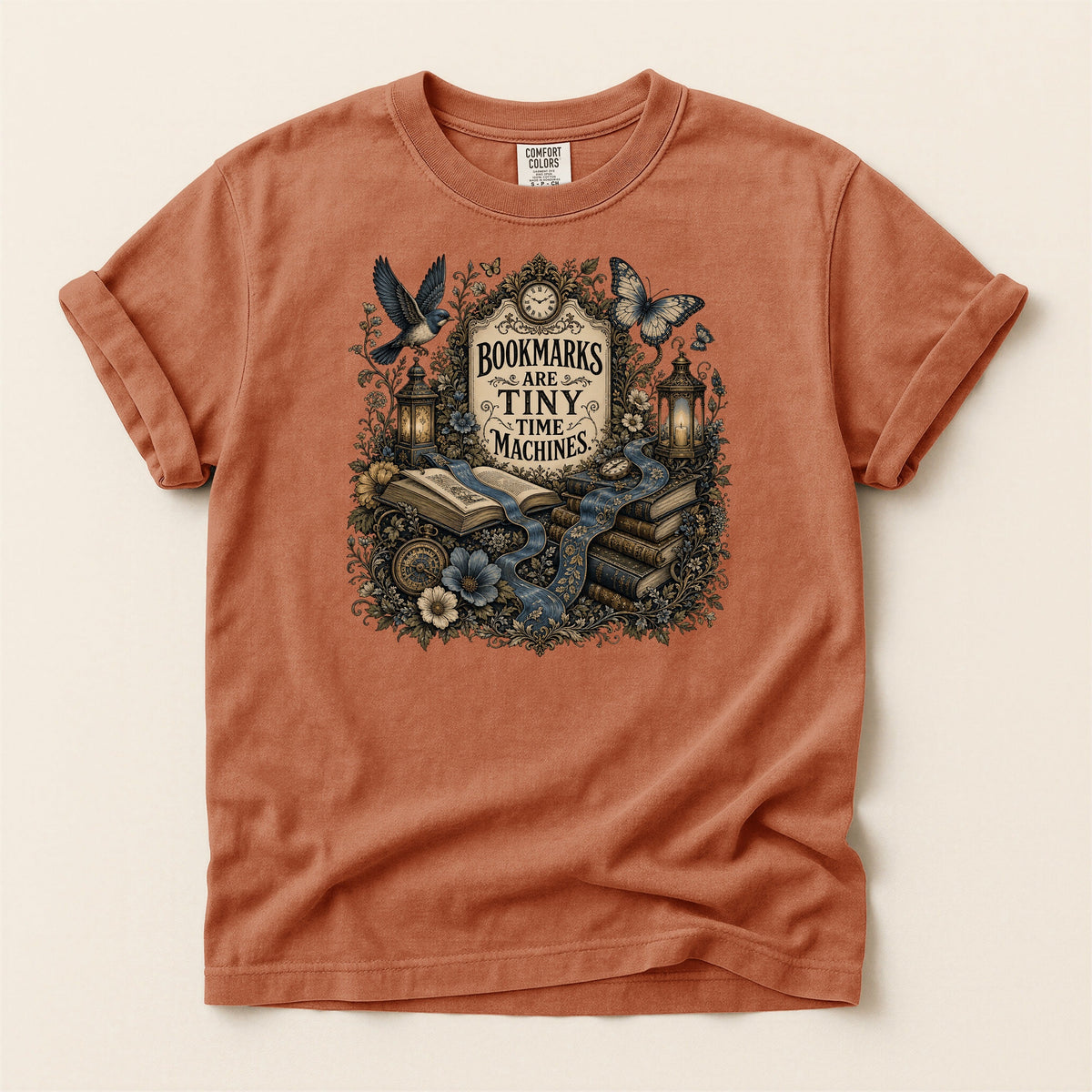 Bookmarks Are Tiny Time Machines bookish tee in Yam, full flat