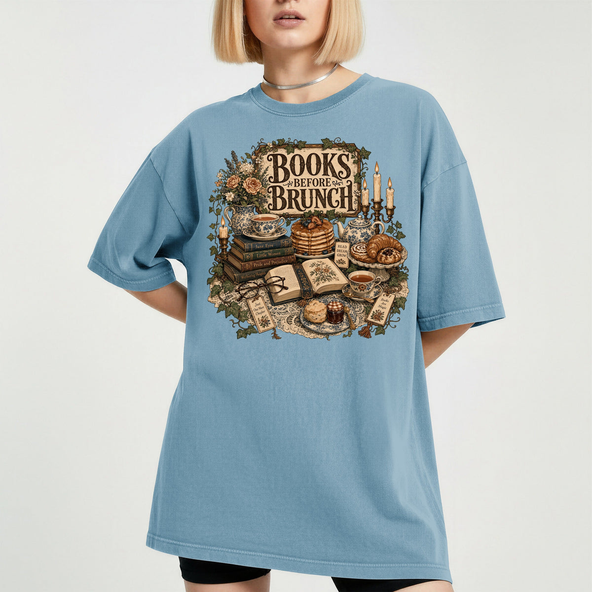 Books Before Brunch bookish tee in Ice Blue, worn