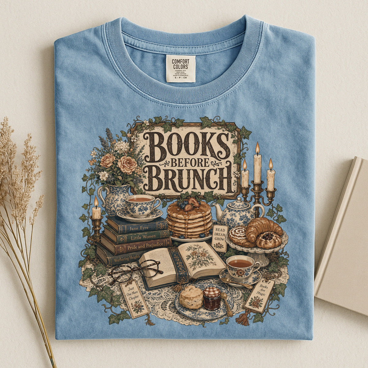Books Before Brunch bookish tee in Ice Blue, flat lay