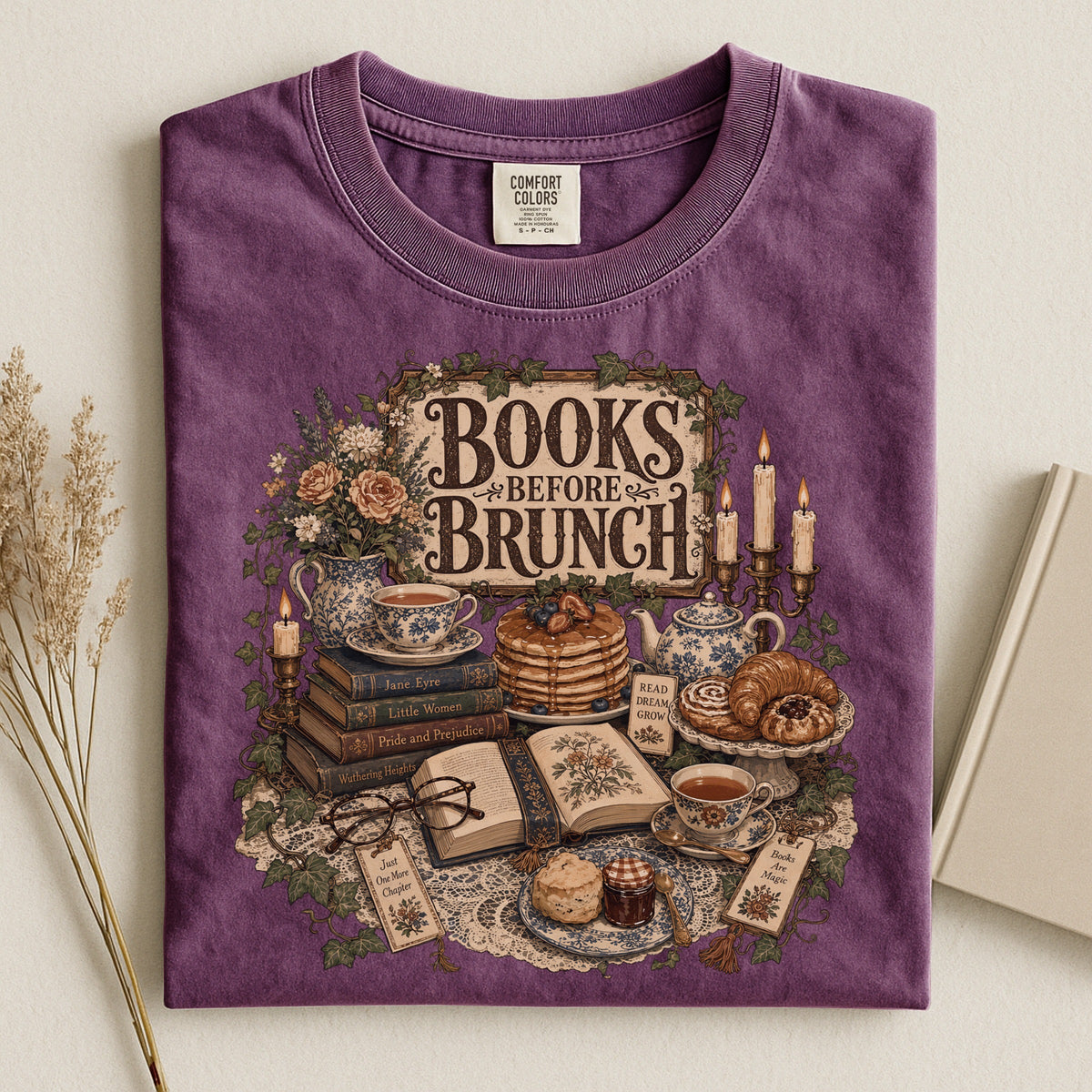 Books Before Brunch bookish tee in Berry, flat lay