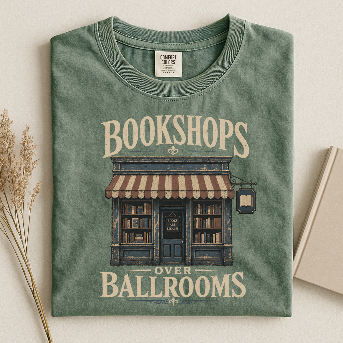 Shelf Love Studio Bookshops Over Ballrooms t-shirt in Moss, styled flat lay