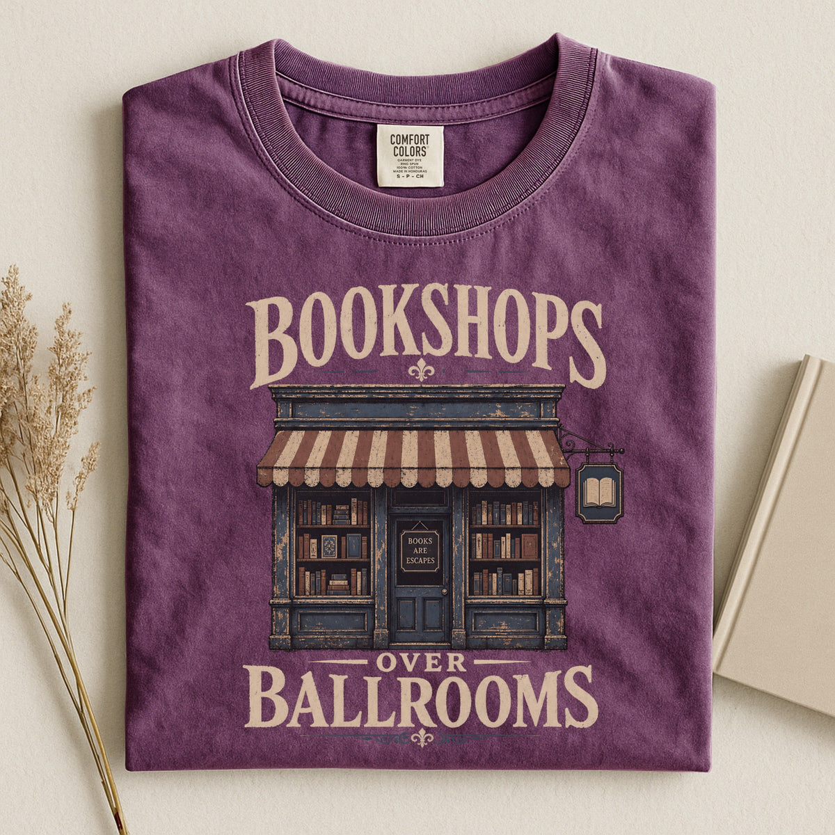 Shelf Love Studio Bookshops Over Ballrooms t-shirt in Berry, styled flat lay