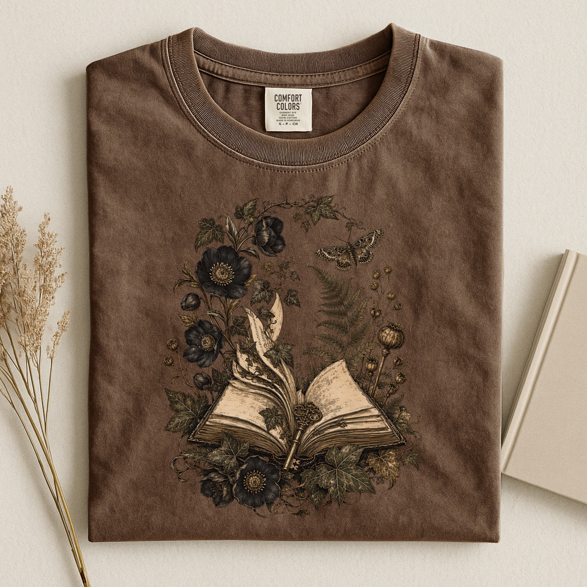 Shelf Love Studio Botanical Open Book t-shirt in Espresso, styled flat lay