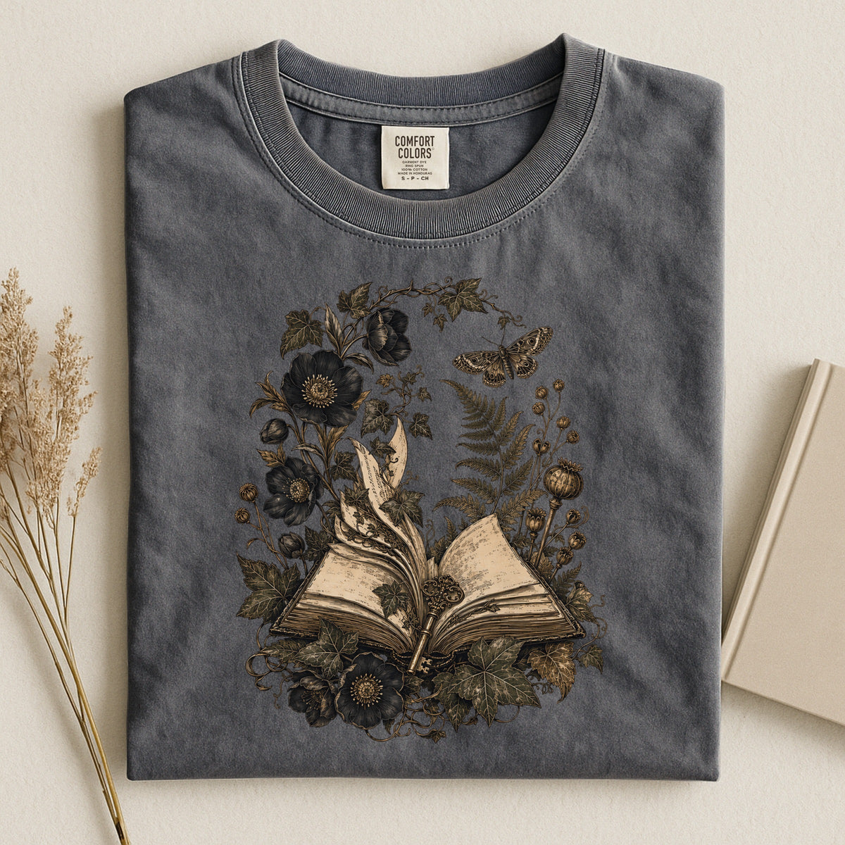 Shelf Love Studio Botanical Open Book t-shirt in Pepper, styled flat lay
