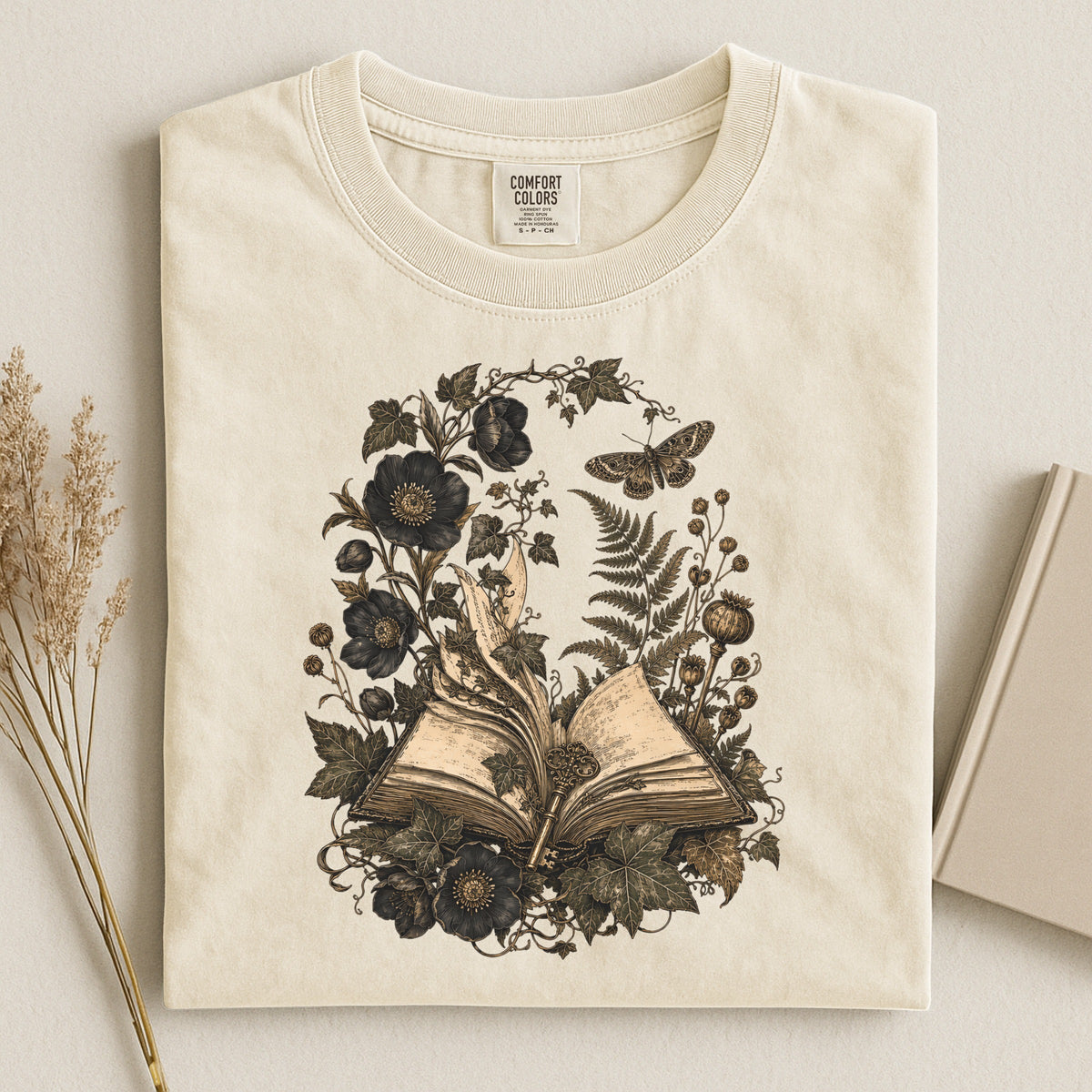 Shelf Love Studio Botanical Open Book t-shirt in Ivory, styled flat lay