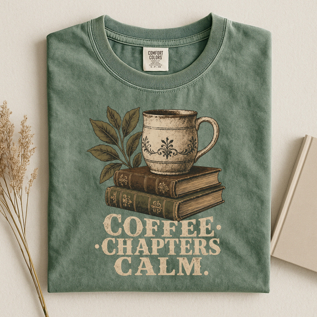 Shelf Love Studio Coffee. Chapters. Calm. t-shirt in Moss, styled flat lay