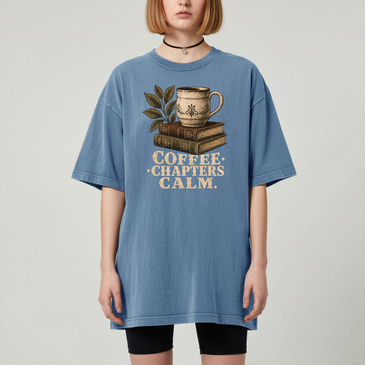 Shelf Love Studio Coffee. Chapters. Calm. t-shirt in Blue Jean, worn
