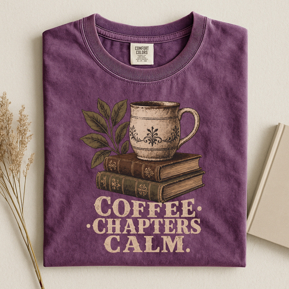 Shelf Love Studio Coffee. Chapters. Calm. t-shirt in Berry, styled flat lay