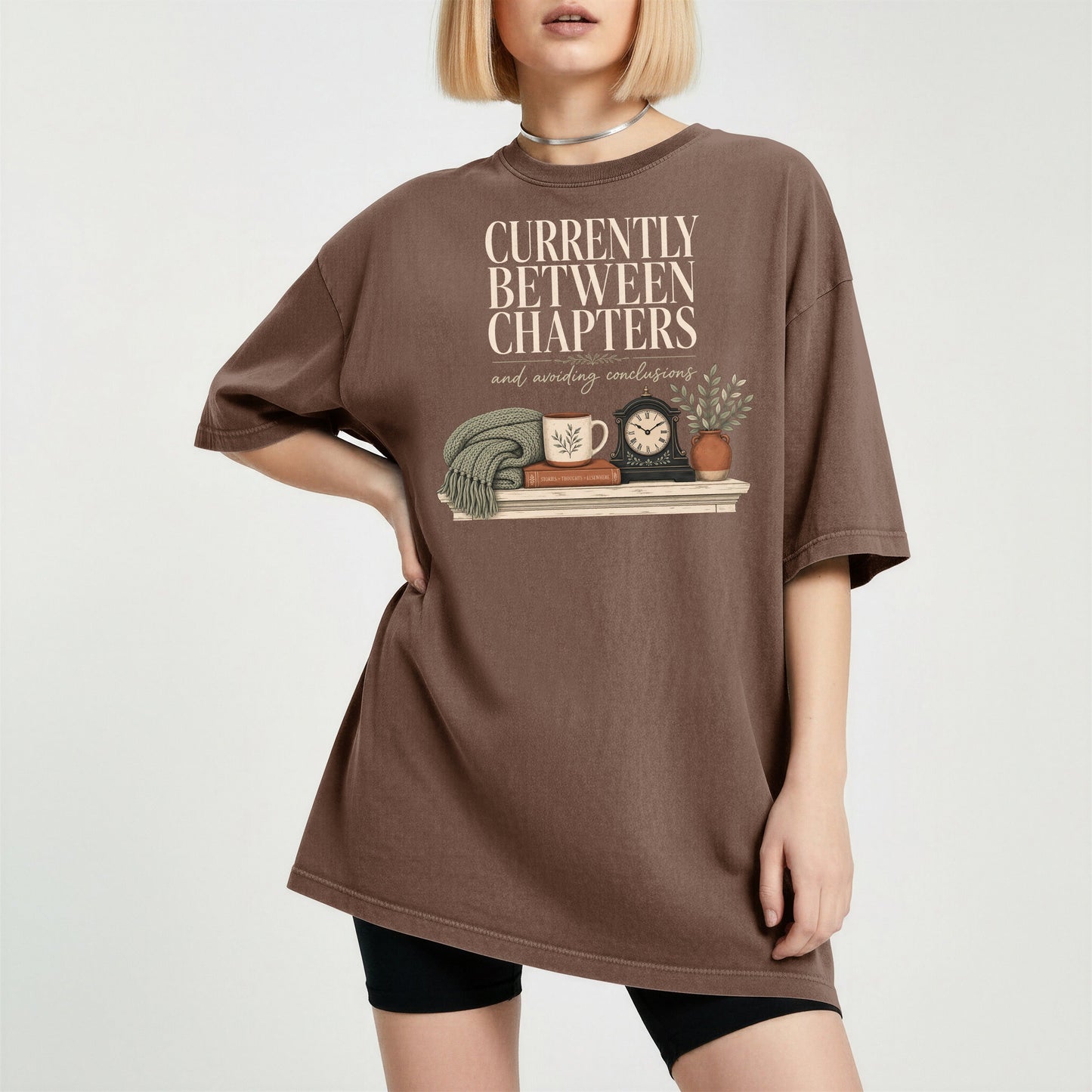 Currently Between Chapters bookish tee in Espresso, worn
