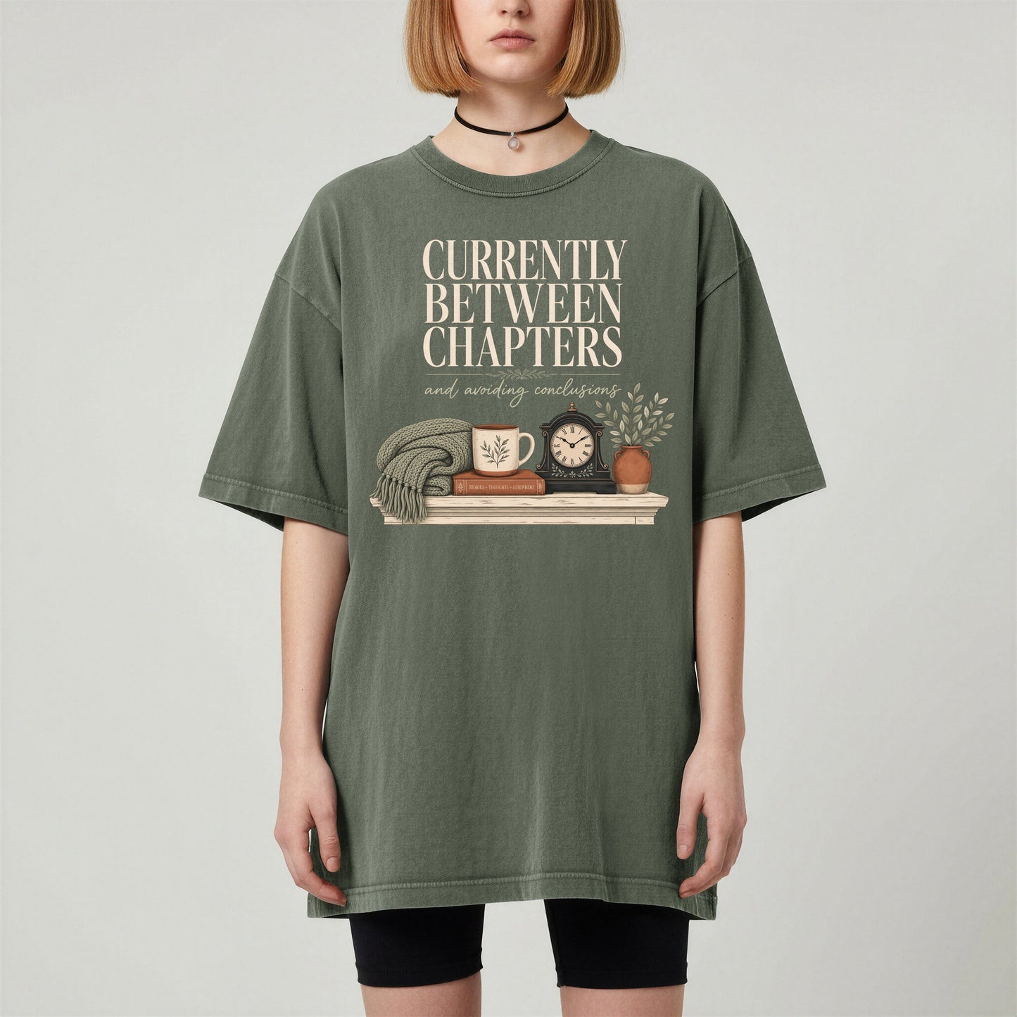 Currently Between Chapters bookish tee in Moss, worn
