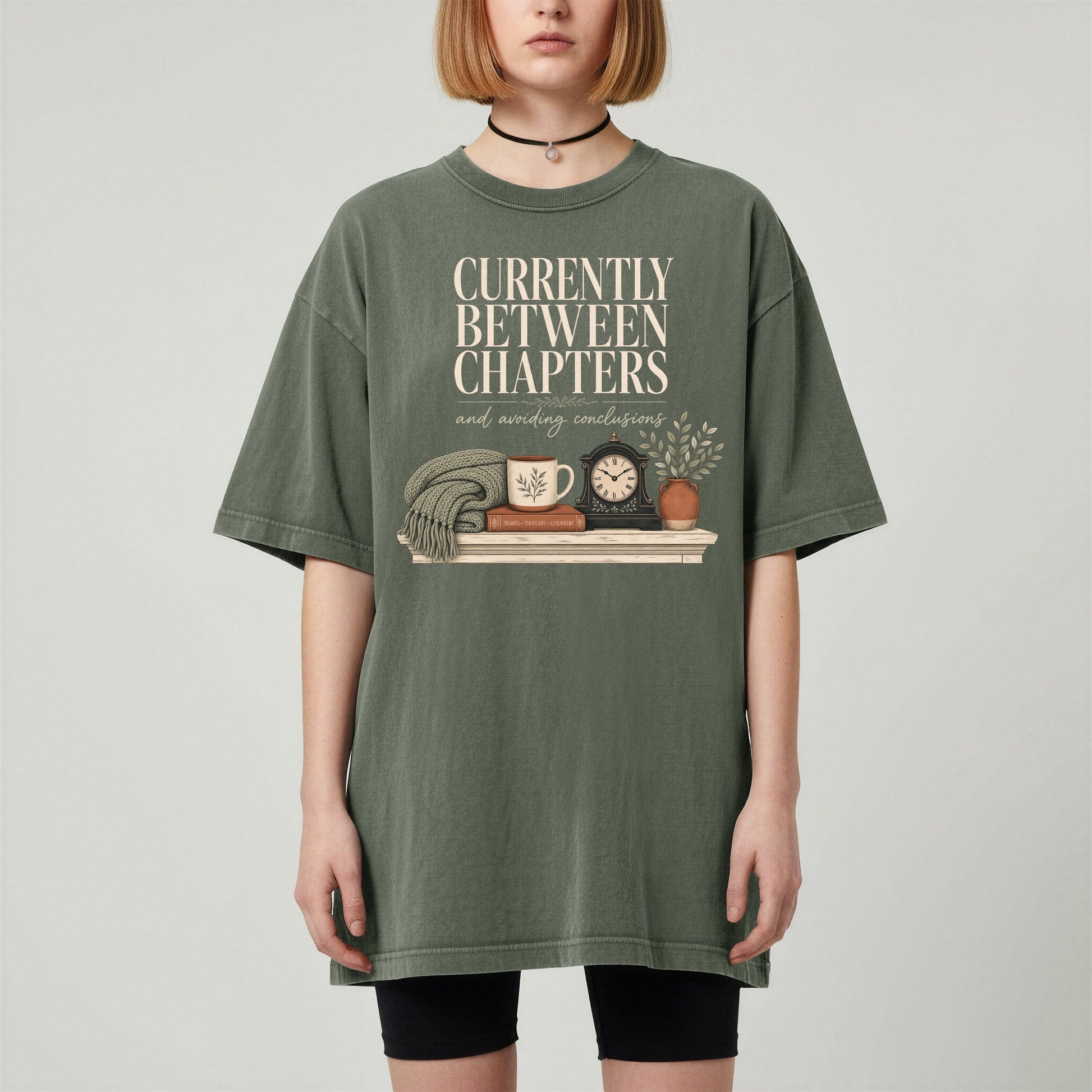 Currently Between Chapters bookish tee in Moss, worn
