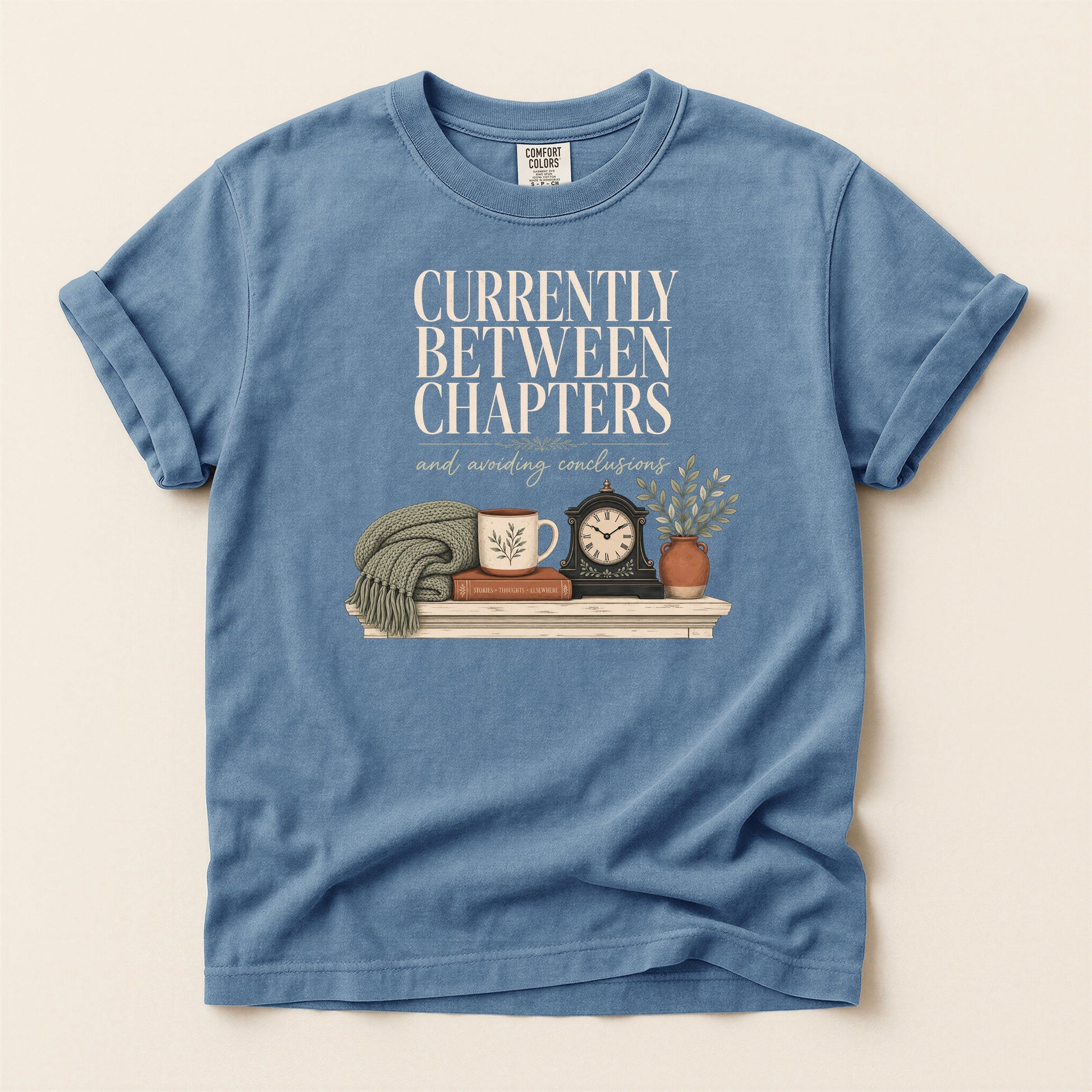 Currently Between Chapters bookish tee in Blue Jean, full flat