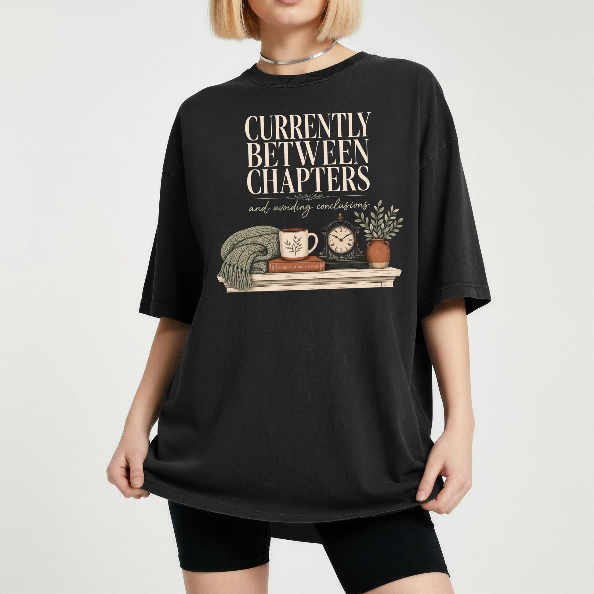 Currently Between Chapters bookish tee in Black, worn