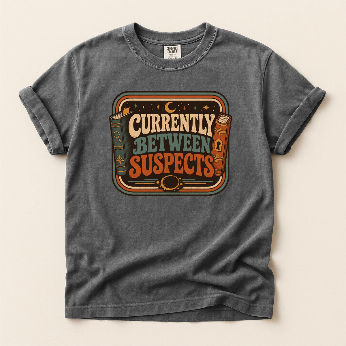 Shelf Love Studio Currently Between Suspects t-shirt in Pepper, flat