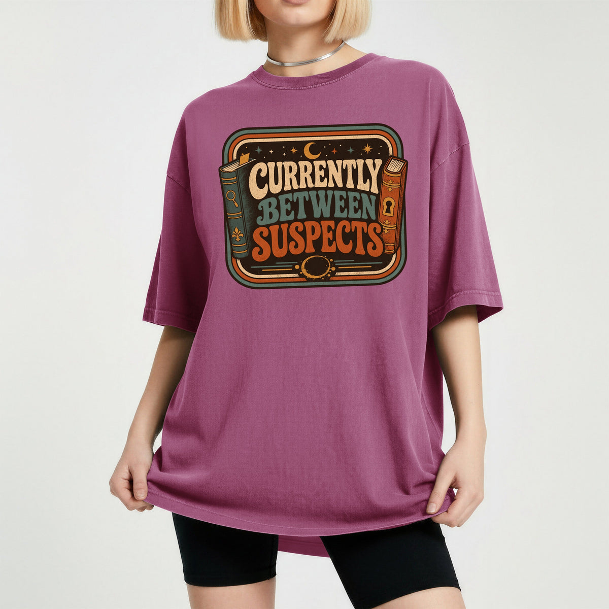 Shelf Love Studio Currently Between Suspects t-shirt in Berry, worn
