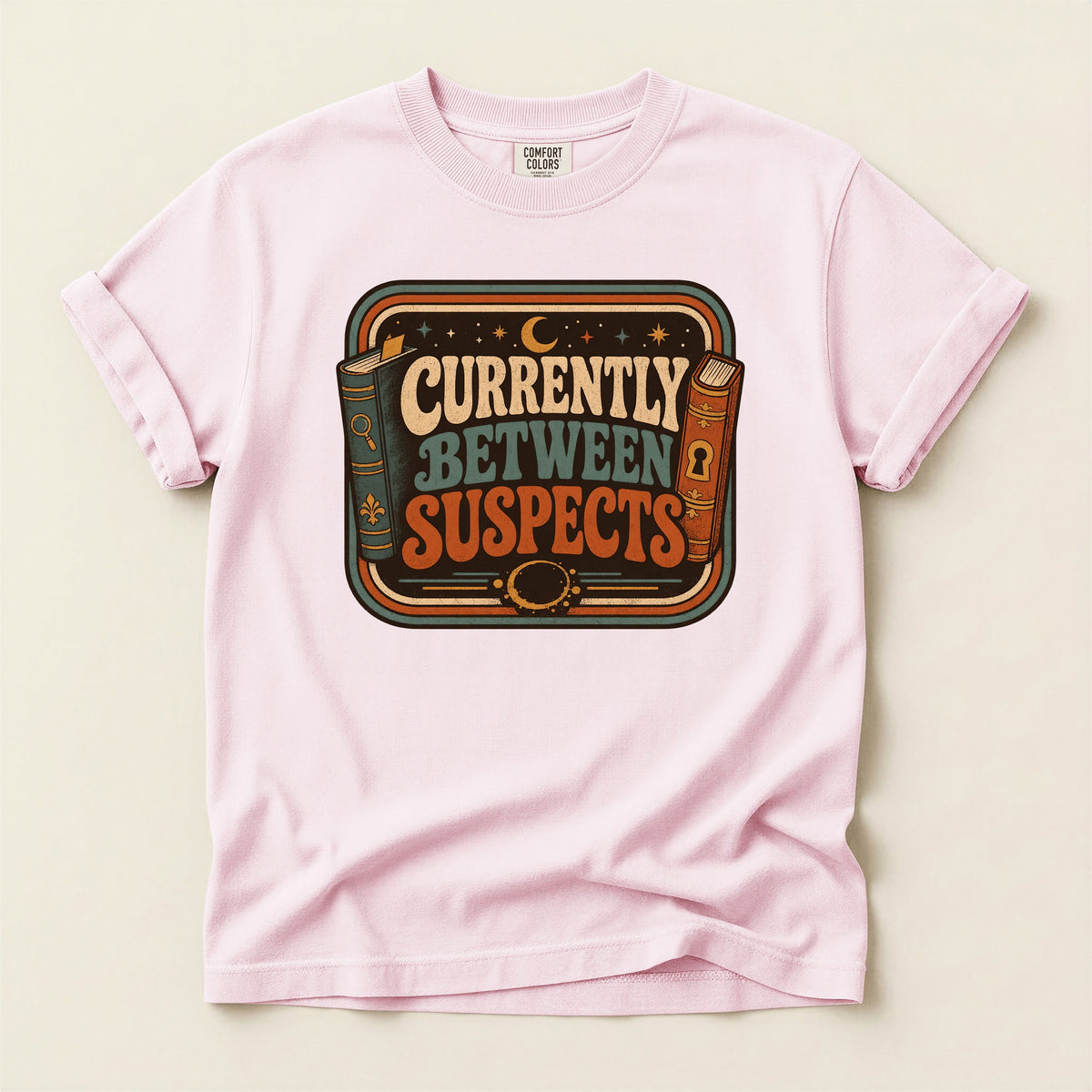 Shelf Love Studio Currently Between Suspects t-shirt in Blossom, flat