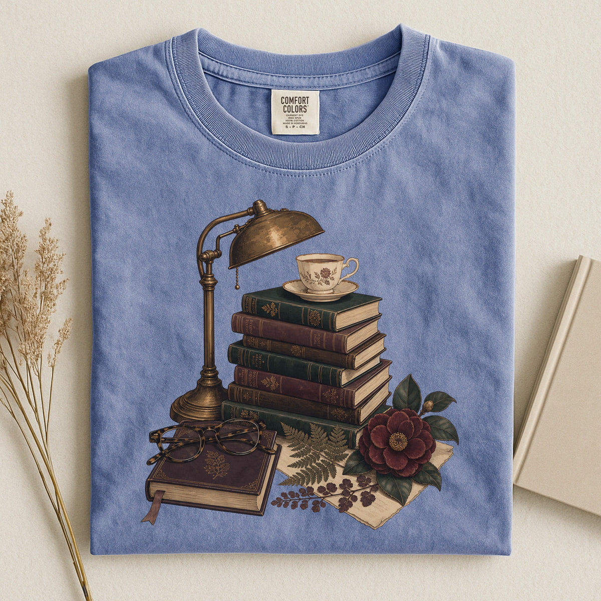 Shelf Love Studio Dark Academia Reading Lamp t-shirt in Blue Jean, styled flat lay