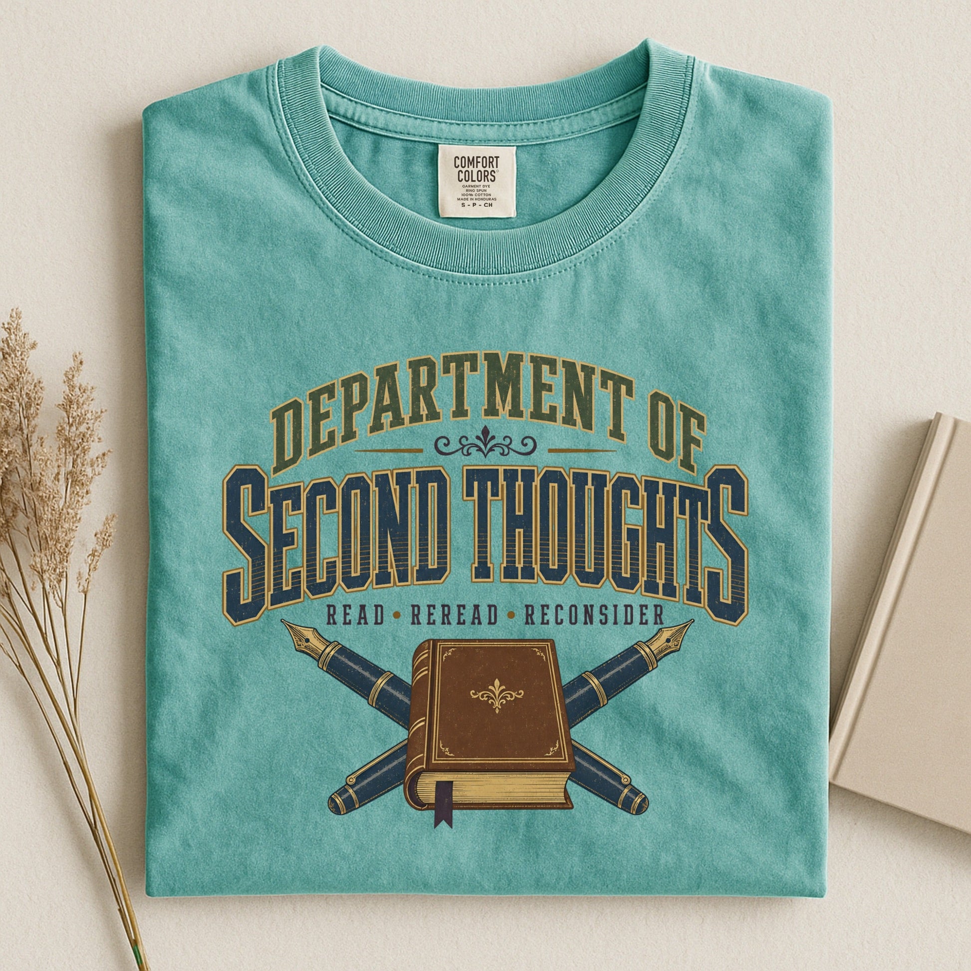 Department of Second Thoughts bookish tee in Seafoam, flat lay
