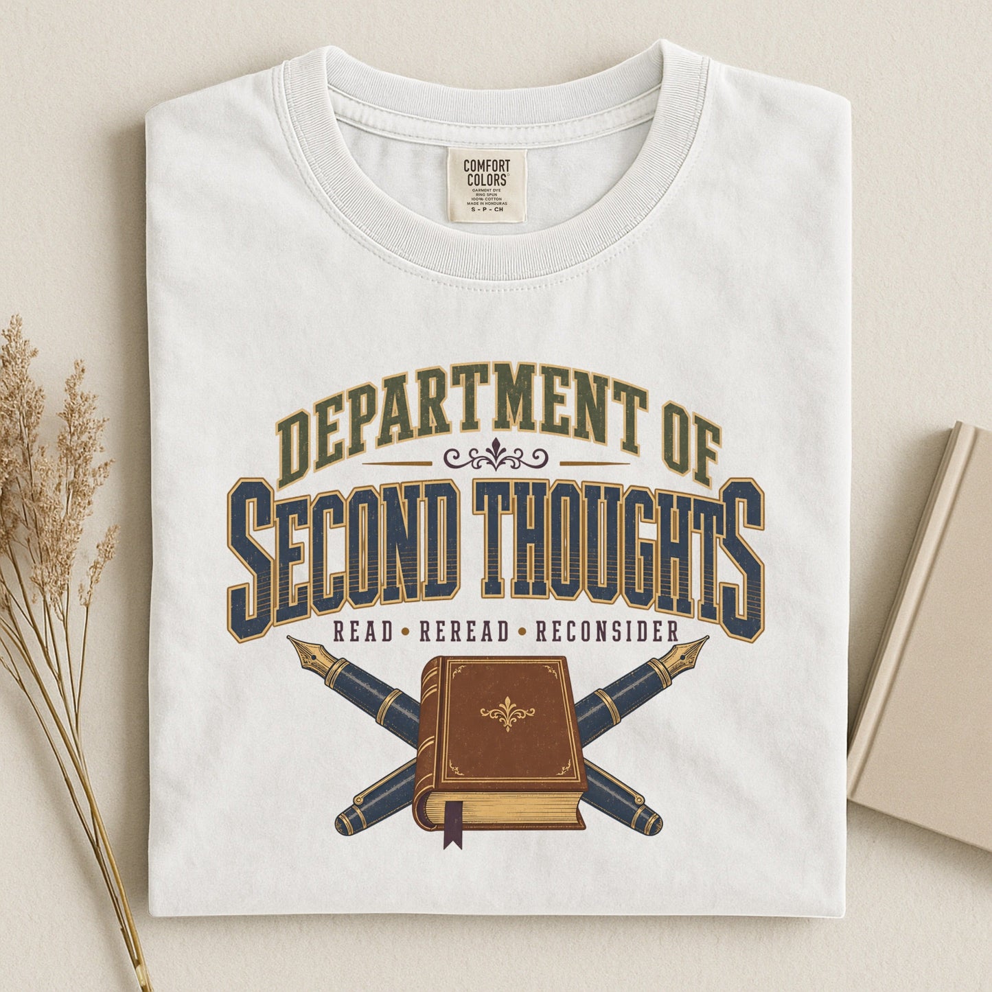Department of Second Thoughts bookish tee in White, flat lay