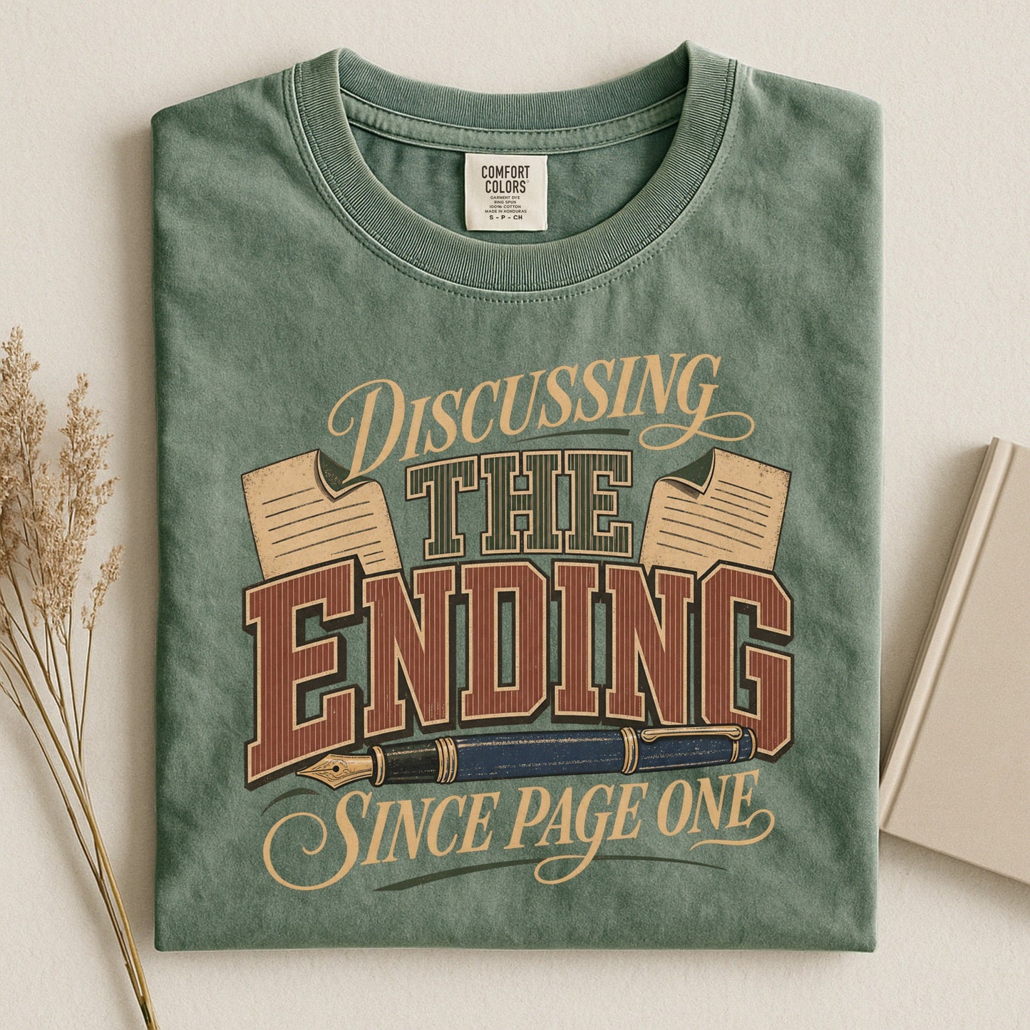 Discussing the Ending Since Page One bookish tee in Moss, flat lay