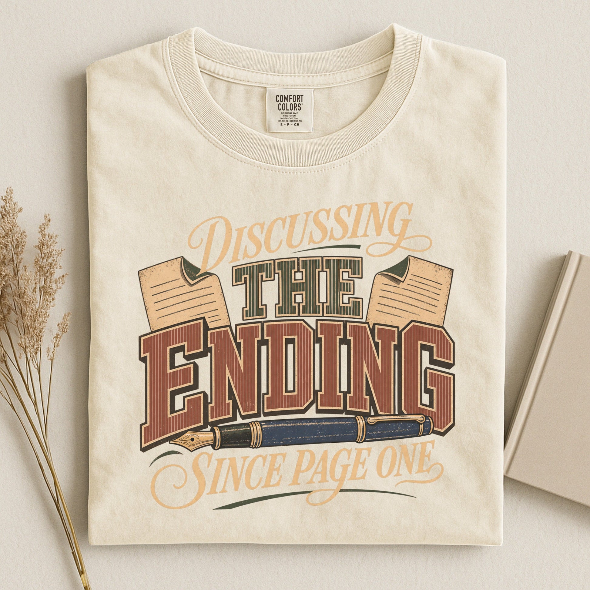 Discussing the Ending Since Page One bookish tee in Ivory, flat lay